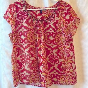 Sheer women’s red and yellow top